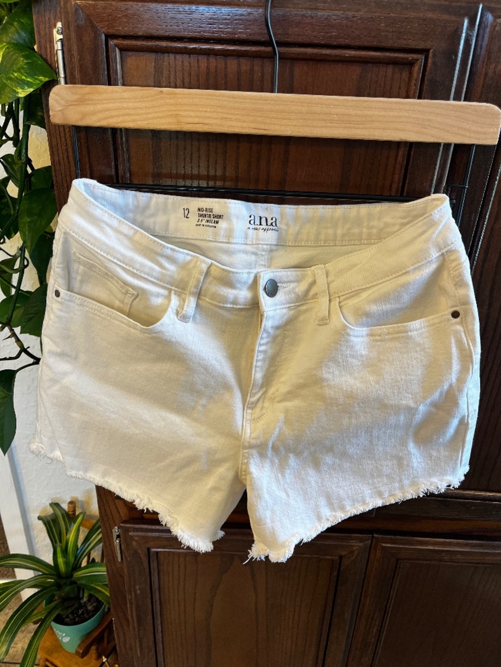 Women’s cut off white shorts size 12.